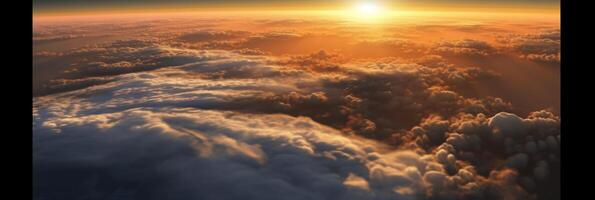 The view from the plane window to the sunset. Aerial view. photo