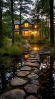 Luminous granite stepping stones leading to cottage in middle of pond. photo