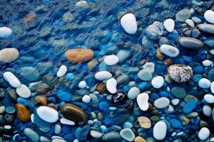 Blue and White Cristal stones like ocean in water. photo