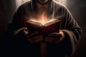 Man is holding and hugging the bible on his chest with atmosphere light. photo