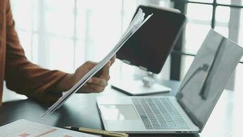 Audit concept,Administrator business man financial inspector and secretary making report calculating balance. Internal Revenue Service checking document. video