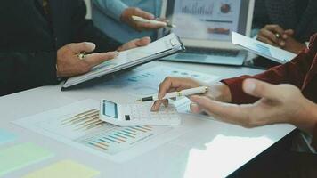 Team of business people working together in the meeting room office, teamwork background charts and graphs banner, double exposure successful teamwork,business planning concept. video