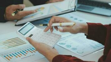 Team of business people working together in the meeting room office, teamwork background charts and graphs banner, double exposure successful teamwork,business planning concept. video