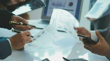 Team of business people working together in the meeting room office, teamwork background charts and graphs banner, double exposure successful teamwork,business planning concept. video