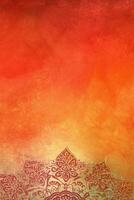 orange Pantone color background paper texture Rangoli pattern painting. photo