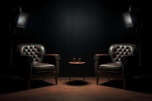 Two chairs and spotlights in podcast or interview room on dark background. photo