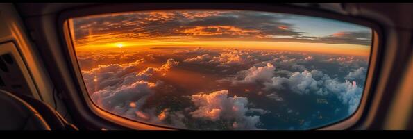 The view from the plane window to the sunset. Aerial view. photo