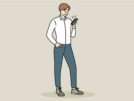 Young man hold cellphone text or message online on gadget. Smiling guy using modern smartphone. Technology and communication. Vector illustration.