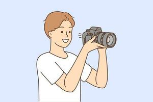 Smiling young man with professional camera taking pictures. Happy guy photographer working with equipment. Photography. Vector illustration.
