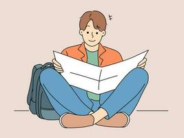 Young man with backpack sitting on floor reading paper map. Male traveler or tourist check route on map. Tourism and travel concept. Vector illustration.