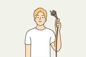 Man demonstrates wire with plug from electrical equipment, offering to turn off appliances for save energy. Young guy with smile offers to abandon use of electrical devices and take care of nature vector