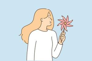 Girl with paper pinwheel in hands blows on toy spinning in wind. Child toy in hand of woman in white casual t-shirt using pinwheel to relieve stress or distract herself after hard day vector