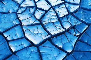 Ice winter floor cracks blue background. photo