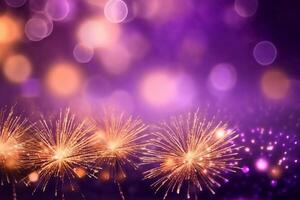 Gold and purple Fireworks and bokeh in New Year eve and copy space. Abstract background holiday, photo