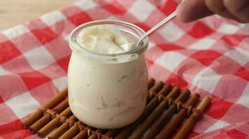 Fresh yogurt in a bowl on table video