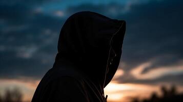 Side view, Silhouette of the face, a person, low angle, blurred fresh dawn sky. photo