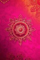 Fuchsia Crayola color background paper texture Rangoli pattern painting. photo