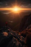 a man is standing on a mountain. photo