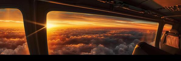 The view from the plane window to the sunset. Aerial view. photo