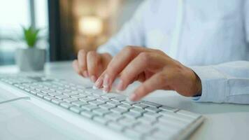 Female hands typing on a computer keyboard. Concept of remote work video