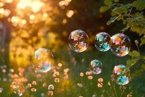 Soap bubbles against a blurred light natural summer background. photo
