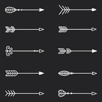 Boho arrows doodle set. Hipster ethnic decorative elements. Hand drawn vector illustration isolated on black background