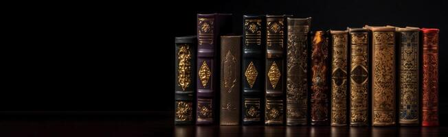 Number of old ancient books, library of knowledge textbooks. Black background isolate. . photo