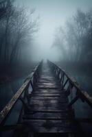 Old wooden bridge leading to nowhere in the fog, broken, gloomy dark blue, mysterious, loneliness. photo