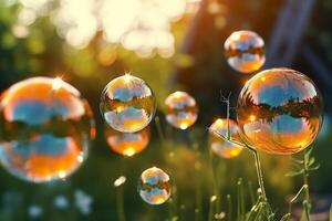 Soap bubbles against a blurred light natural summer background. photo