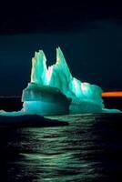 photo of luminescent iceberg, amazing nature.