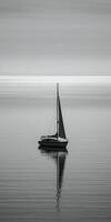 white image of a lone sailboat on a calm sea, photo