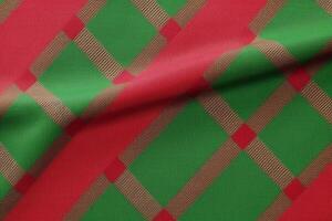 red fabric textile pattern, plaid background, linen cotton. photo