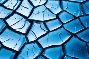 Ice winter floor cracks blue background. photo