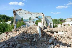 Collapsed industrial multistorey building in daytime photo