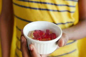 hand pick colorful sweet candy photo