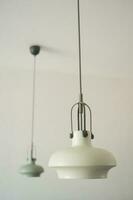 gray ceiling lamp hanging in a room , photo