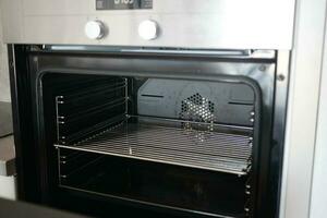 open electric oven at home photo