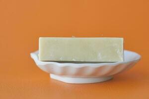 natural soap bar on table photo