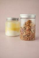 granola Musli and lemon yogurt in a jar photo