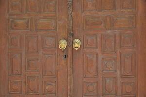 a brown wood old door in turkey photo
