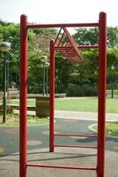 Exercise equipment in a public park i in residential area photo