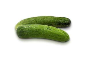Fresh cucumbers are placed on a white background. photo