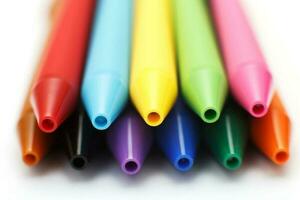 Multicolored gel pens isolated on a white background, close-up. Copy space photo