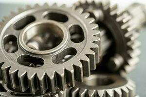 Gear and cogs wheels, clock mechanism, brass metal engine industrial. photo