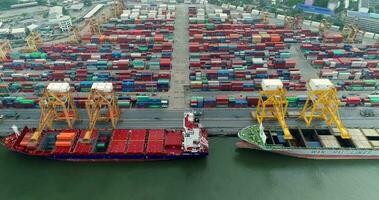 Aerial view 4k drone of container ships and lifting cranes in the Port of Bangkok on sunrise. 2018-07-24 Thailand. video