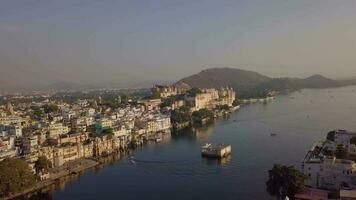 Aerial view 4k video by drone of Lake Pichola And City Palace, Udaipur, Rajasthan, India