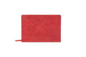 Red notebook cover on white background photo