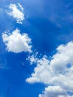 Blue sky with white clouds. Nature background. Copy space for text. photo
