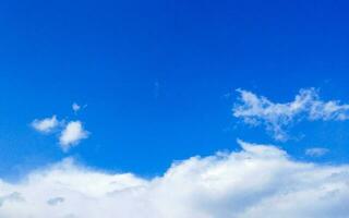 Blue sky with white clouds. Nature background. Copy space for text. photo