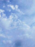 Blue sky with white clouds. Nature background. Copy space for text. photo